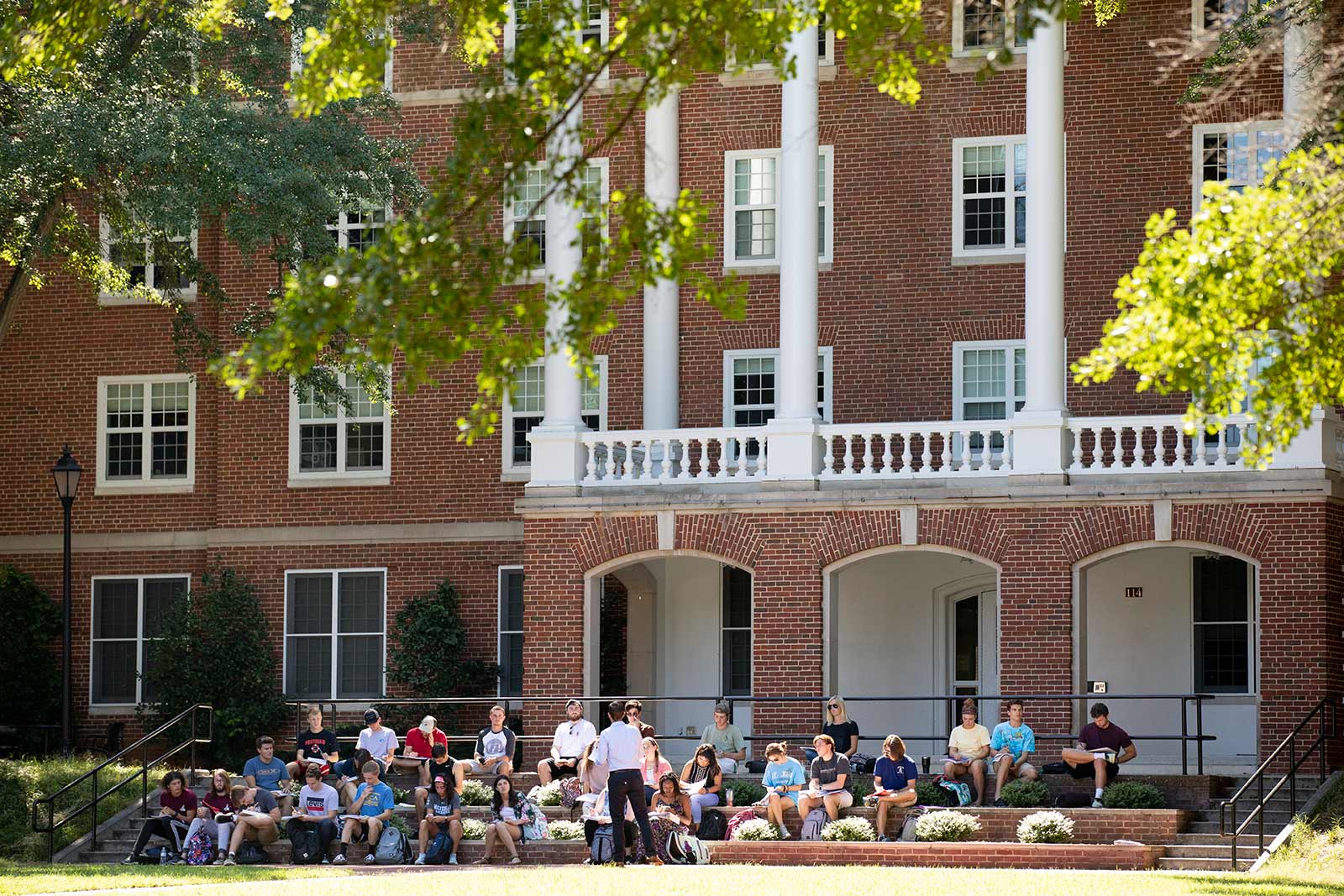 Few faculty members can resist holding classes outside under the giant oaks during perfect spring and fall days.