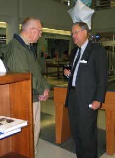 Wendell Barbour, Dean of the Library and Learning Services (right) chats with Maurice Sneller.