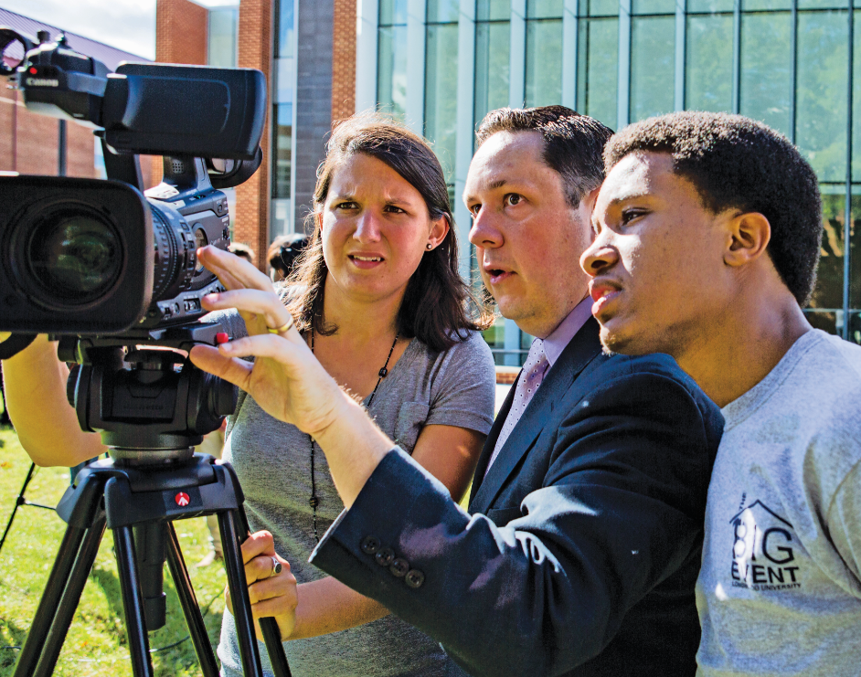 ‘If you come here to be a journalist, you can be a journalist,’ says Jeff Halliday (center), associate professor of communication studies at Longwood.