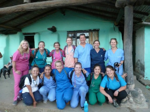 Longwood nursing students pose in scrubs in Ecuador 