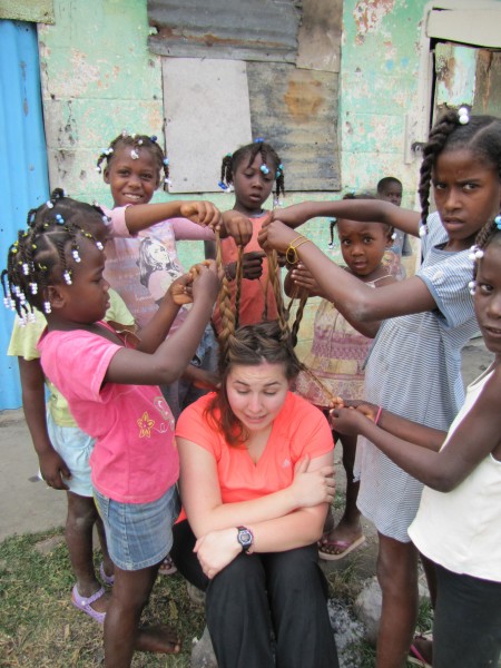 Woman gets her hair braided in the Dominican Republic