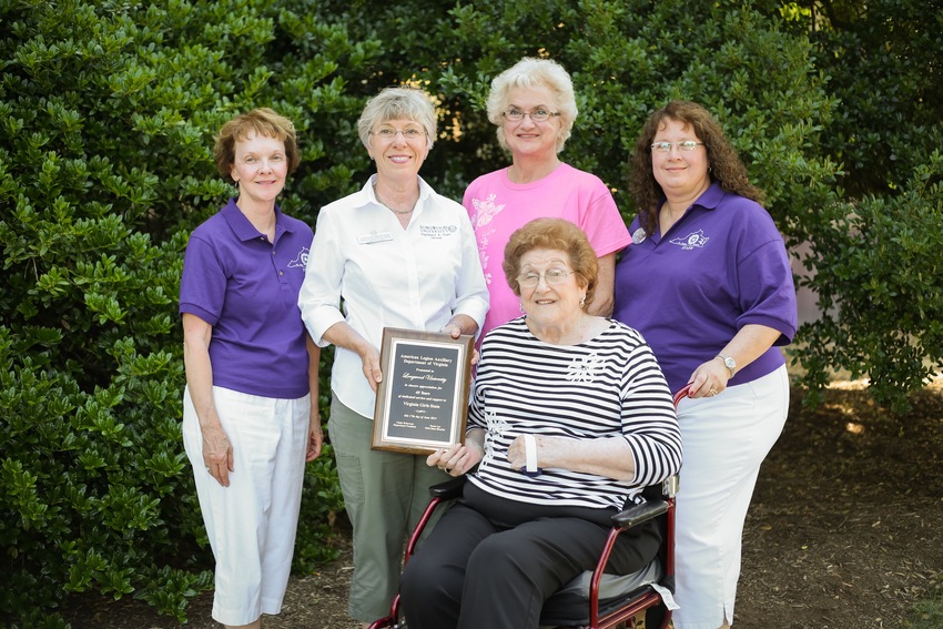 Pictured with the plaque: Susan Lee (left), Girls State director; Darlene Bratcher, Longwood University director of conferences and event services; Anna Gear (seated), past American Legion Auxiliary national president; Peggy Thomas, Girls State secretary and past American Legion Auxiliary national president; and Cindy Kokernak, American Legion Auxiliary department president.