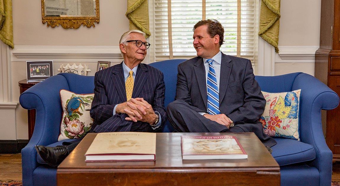 W. Taylor Reveley III, president of the College of William & Mary, and his son, W. Taylor Reveley IV, president of Longwood University, enjoy a visit in Williamsburg. (Credit: Skip Rowland)