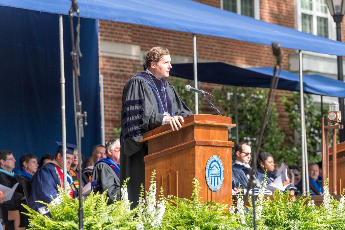 President Reveley speaking at the podium during commencement