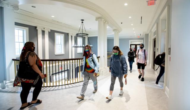 Students walking through the hallway of the new Allen Hall