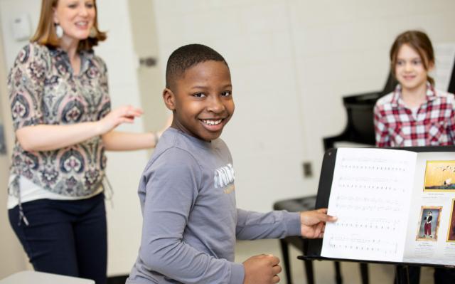 Child participating in LCCM class