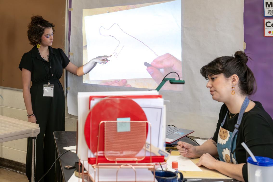 Student works with supervisor in a classroom during a work shadow
