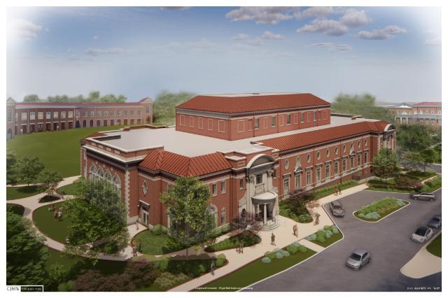 Architectural rendering of a large brick building with a red-tiled roof, classical columns, and arched windows, surrounded by landscaped greenery, pathways, and a small parking lot with cars; additional buildings and green spaces are visible under a partly cloudy sky.