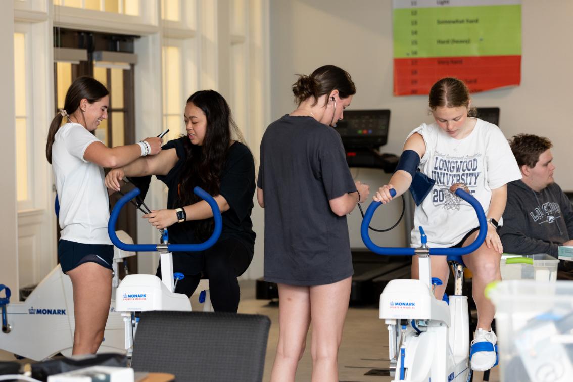 Longwood kinesiology students conduct exercise testing on stationary bikes