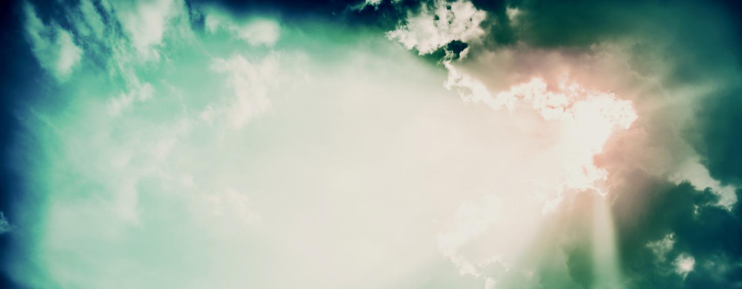 Sun shining through clouds