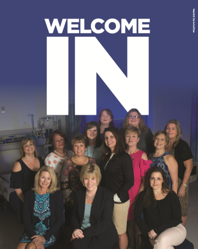 Dr. Kim Little (front row, center), who arrived at Longwood this fall as chair of the nursing department, gathers with department faculty and staff in the Clinical Simulation Learning Center. (Photo courtesy of Meridith De Avila Khan)