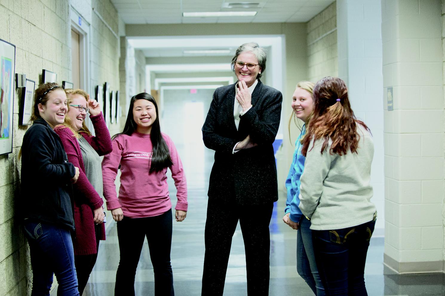 Adventurer Tori McClure (center), president of Spalding University.