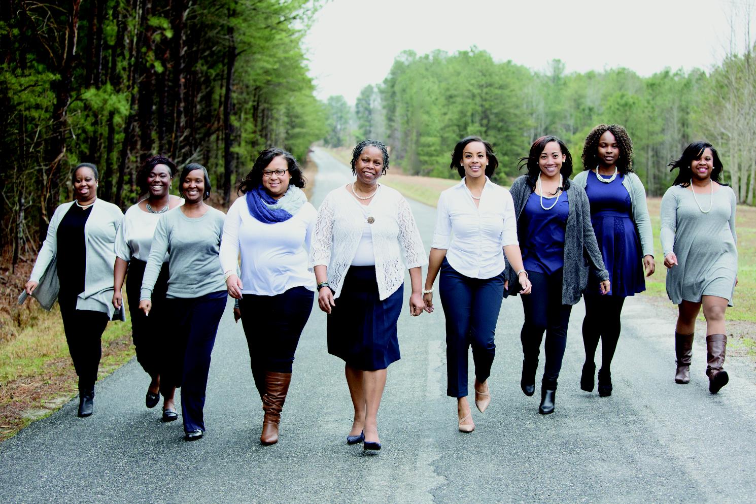 Keeping Longwood in the family: Shawnta Farrar ’00 (left), Stacie Whisonant ’03, Wartena Crowder Somerville ’06, Sonya E. Ragsdale ’10, Hattie Farrar ’95, Christy Falika Grigg ’09, Sierra Hurt ’10, Kimberlee Whisonant ’06 and Tacarra Marchman ’08.
