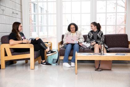 Students sit together on a couch