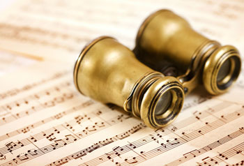 Opera binoculars on sheet music