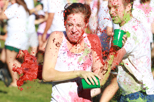 Students throwing paint