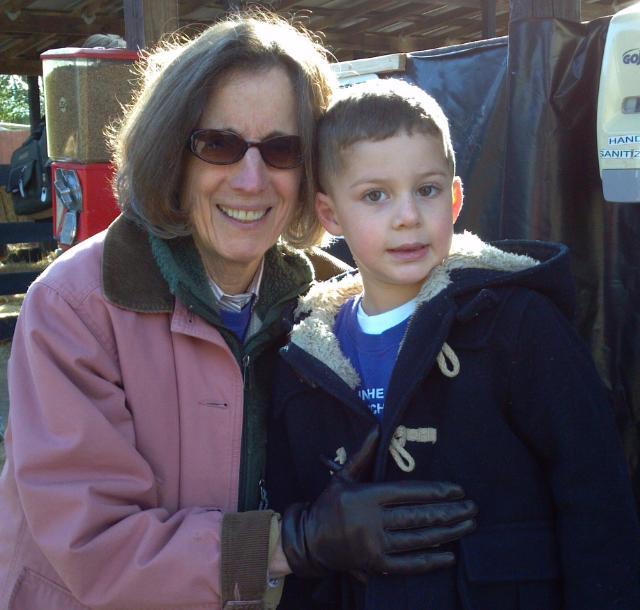 Dr. Taylor with a former preschool student on an autumn field trip to Pumpkinville outside of Leesburg, Va.