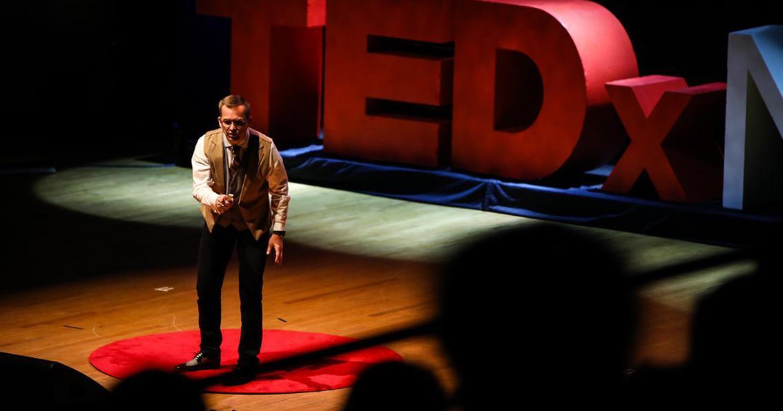 Dr. Chris Kukk gives a talk on the power of compassion at a TEDxTalk in Nashville