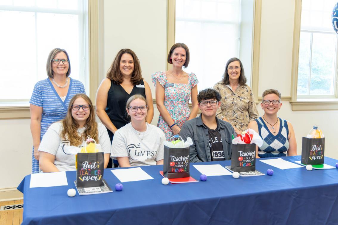This year's four signees with the members of the selection committee, including (second row, L to R) Professor of Chemistry Dr. Melissa Rhoten, Director of the Institute for Teaching Through Technology and Innovative Practices (ITTIP) Dr. Paula Leach, Professor of Mathematics Education Dr. Leah Shilling-Stouffer and Professor Emerita Dr. Sharon S. Emerson-Stonnell