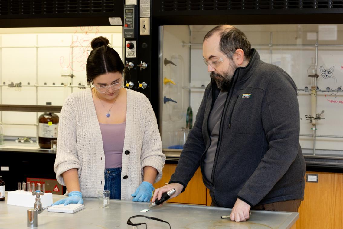 Dr. St. Clair demonstrates the use of the TLC scientific process with Moorea Whitfield '26