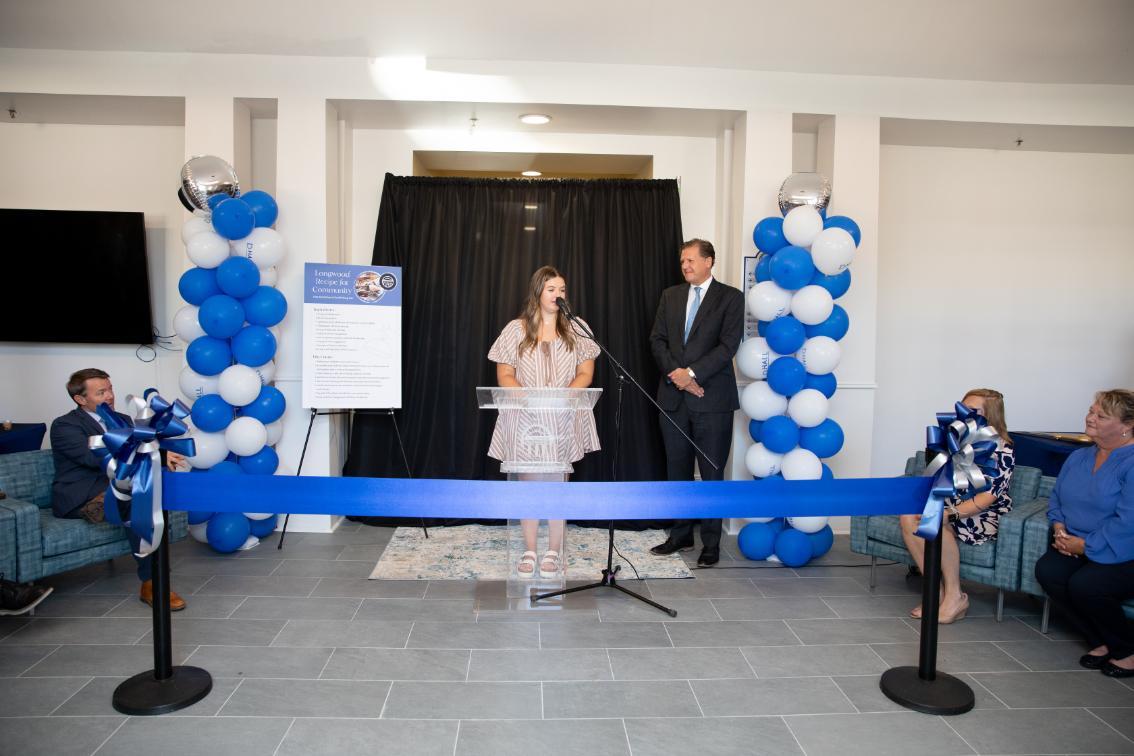 SGA President Cameron Lowery '27 speaks at the D-Hall grand reopening celebration.
