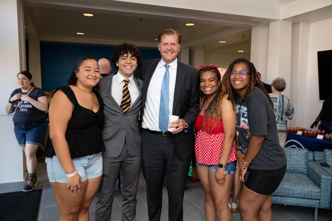 Students, pictured with President W. Taylor Reveley IV, enjoyed fun activities during Monday's grand reopening event.