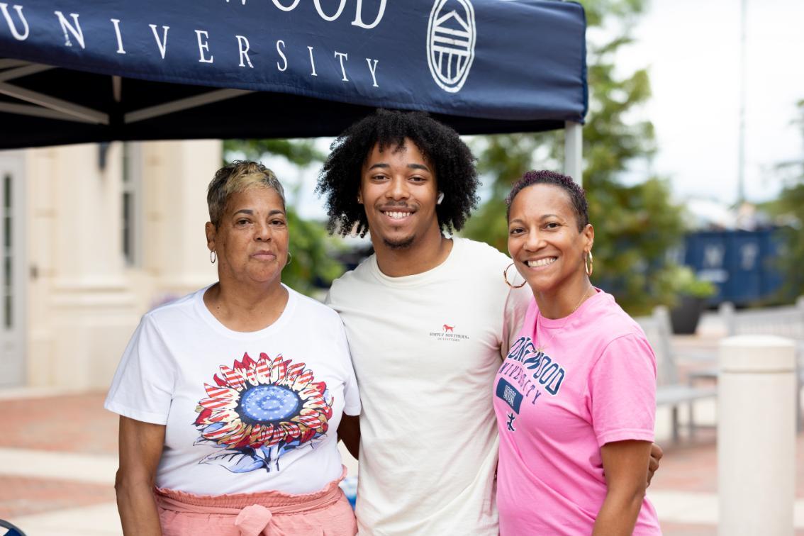 Jackson Morris '29 with his mom and grandmother
