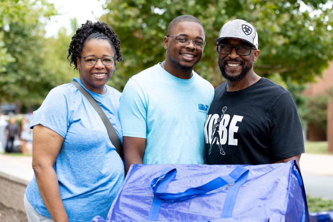 James Robinson ’29 with his parents Maranda Herndon Robinson ’99  and James Robinson, Jr. ’99