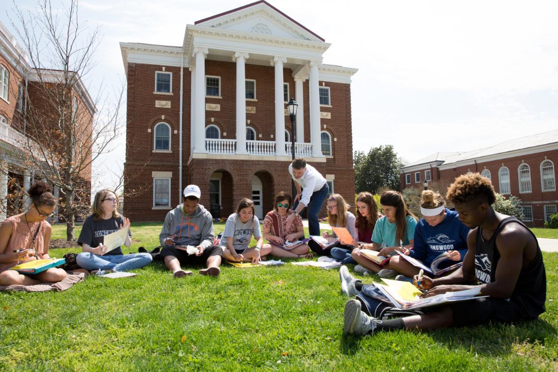 Dr. Wade Edwards leads an class outside of Grainger