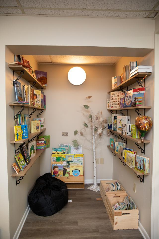 Within A Giving Tree, there is a quaint space for children to sit, read and peruse the books offered