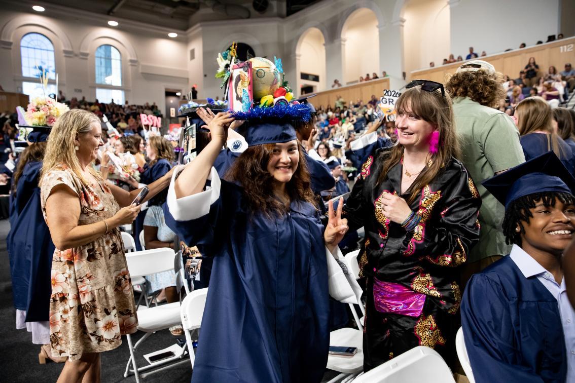 Somaya Ahmadi ’26 is capped during Convocation by Juanita Giles