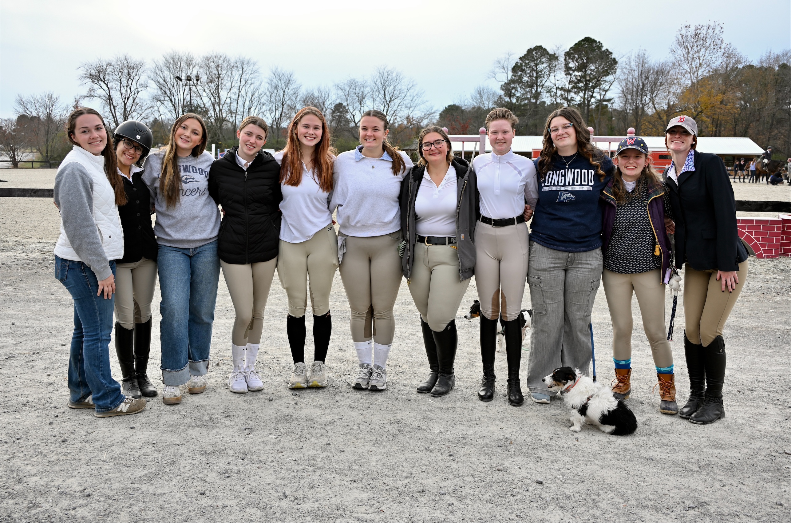 Members of the 2025-26 Longwood Equestrian Team, from left to right: Hannah Rayfield ’26, Kamillah Sheikh-Yassin ’29, Elsa Ikner ’29, Madison Zipf ’28, Peyton Clapper ’27, Olivia Sisk ’26, Lorelei Long ’27, Paige Cubeta ’29, Eleanor Waldschuetz ’29, Charlotte Schroeder ’29 and Alison Tomlin ’29.