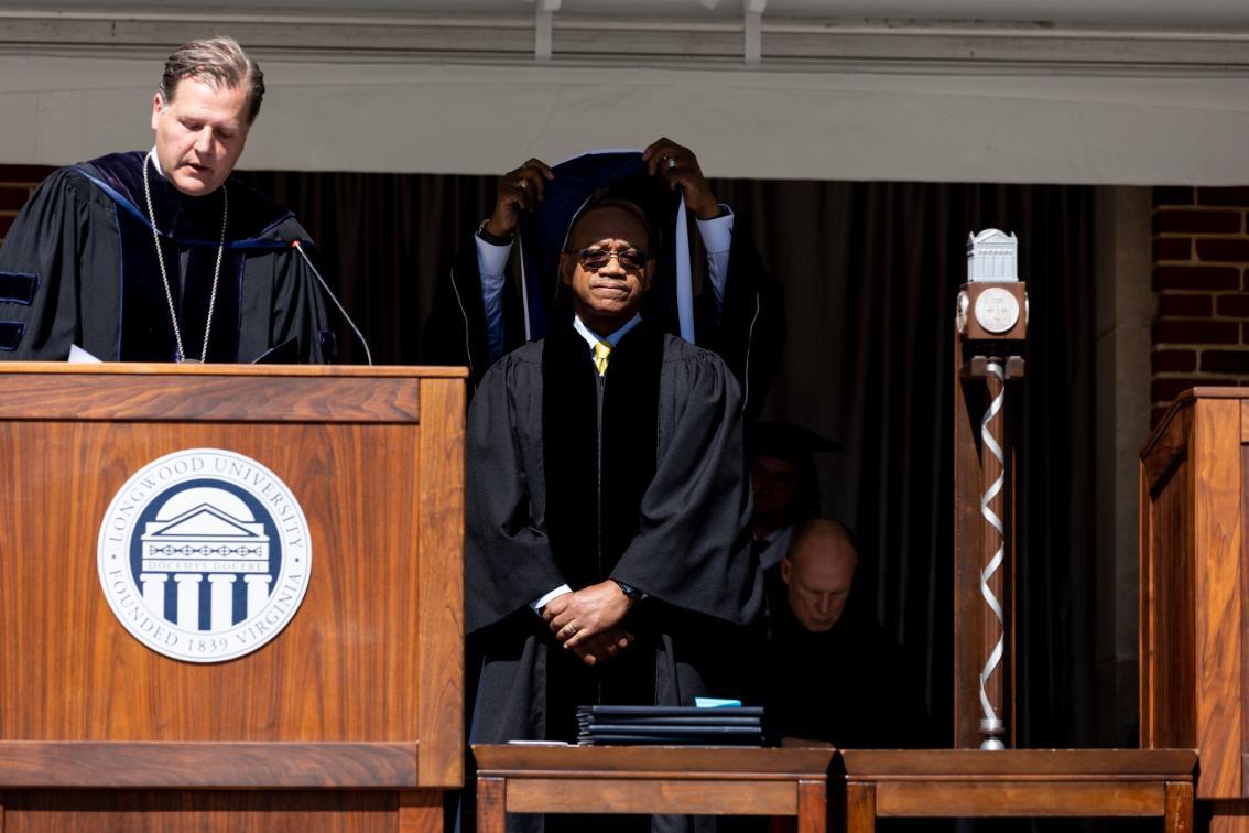 The Honorable Bernard Goodwyn is presented with an honorary degree.