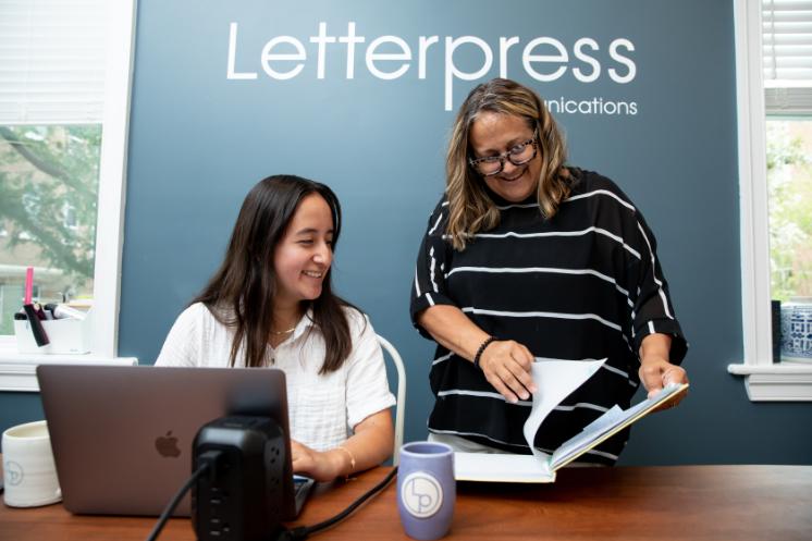 Student intern for Letterpress Communications collaborates with Letterpress' Jenn Kinne, Director of Community Success
