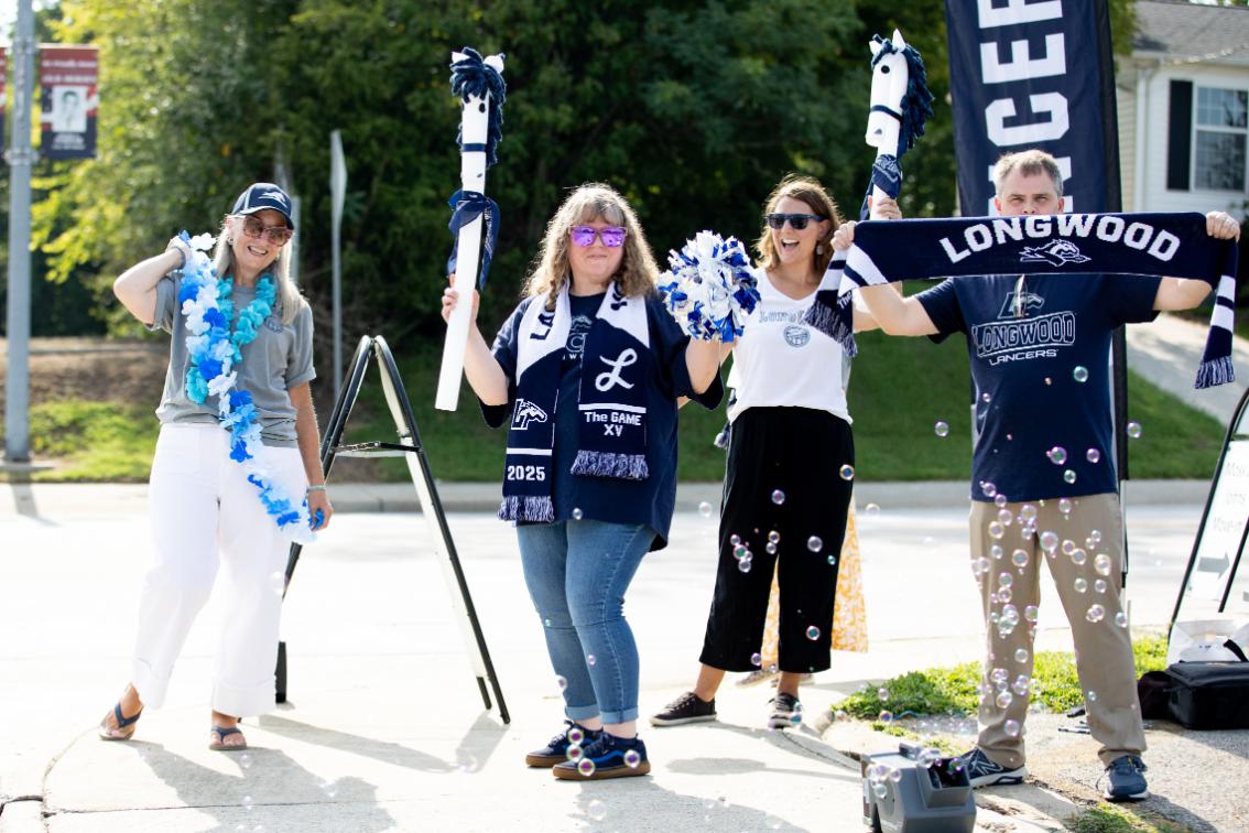 Staff volunteers, including some from Greenwood Library, welcomed new Lancers to campus during freshman move-in at the corner of Main Street and Wynne Drive.