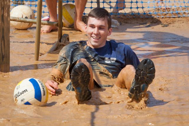 Student in the mud playing oozeball