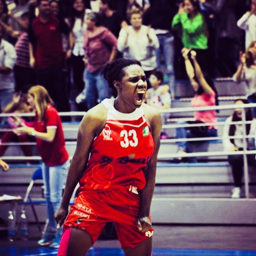 Tajay Ashmeade as female basketball player rejoices.